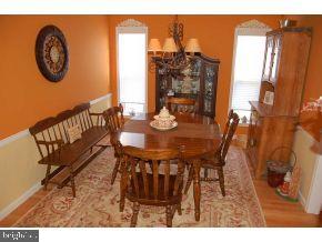 101 Toggle Road Manahawkin, NJ 08050 - Photo 4 of 12 a view of a dining room with furniture and wooden floor