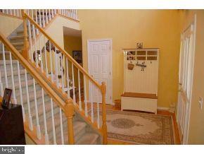 101 Toggle Road Manahawkin, NJ 08050 - Photo 7 of 12 a view of entryway with wooden floor