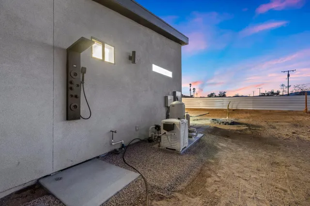 a view of a terrace with water heater and a cabinet