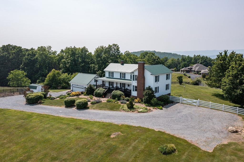 150 Ridgemore Drive Raphine, VA 24472 - Photo 2 of 75 an aerial view of a house with swimming pool garden and patio