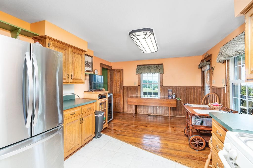 150 Ridgemore Drive Raphine, VA 24472 - Photo 23 of 75 a kitchen with stainless steel appliances a stove a refrigerator and cabinets