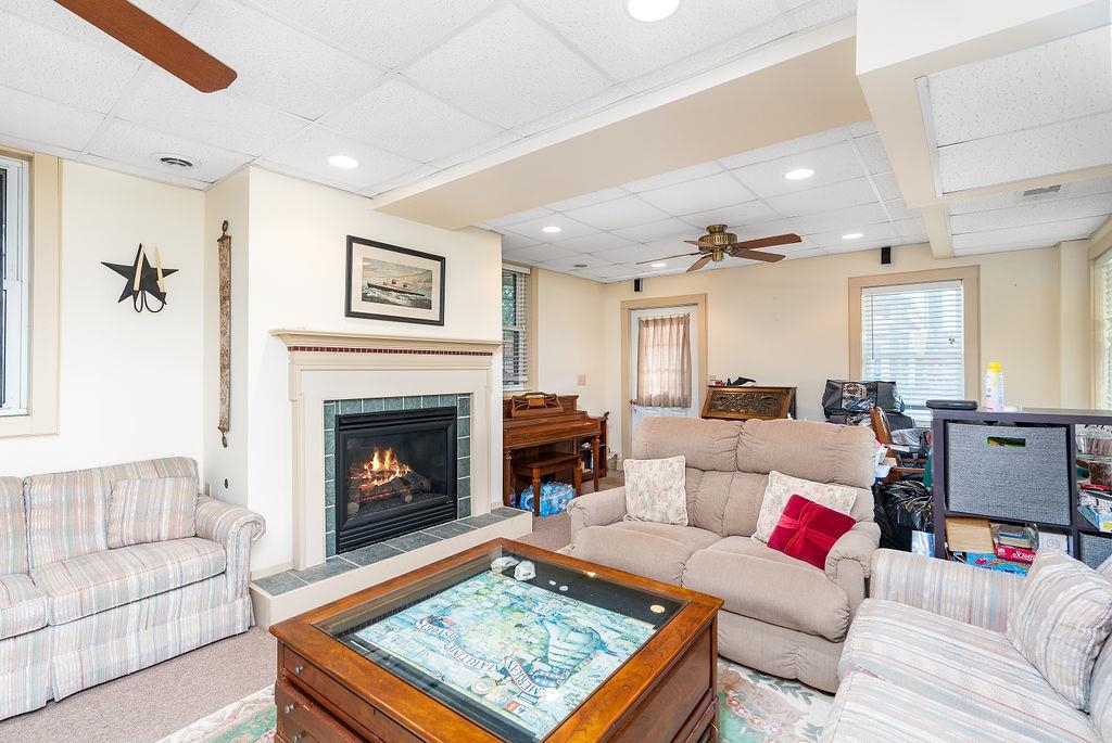 150 Ridgemore Drive Raphine, VA 24472 - Photo 50 of 75 a living room with furniture and a fireplace