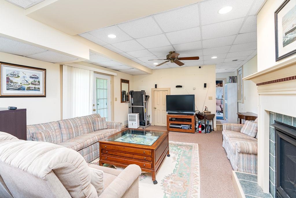 150 Ridgemore Drive Raphine, VA 24472 - Photo 51 of 75 a living room with furniture and a flat screen tv