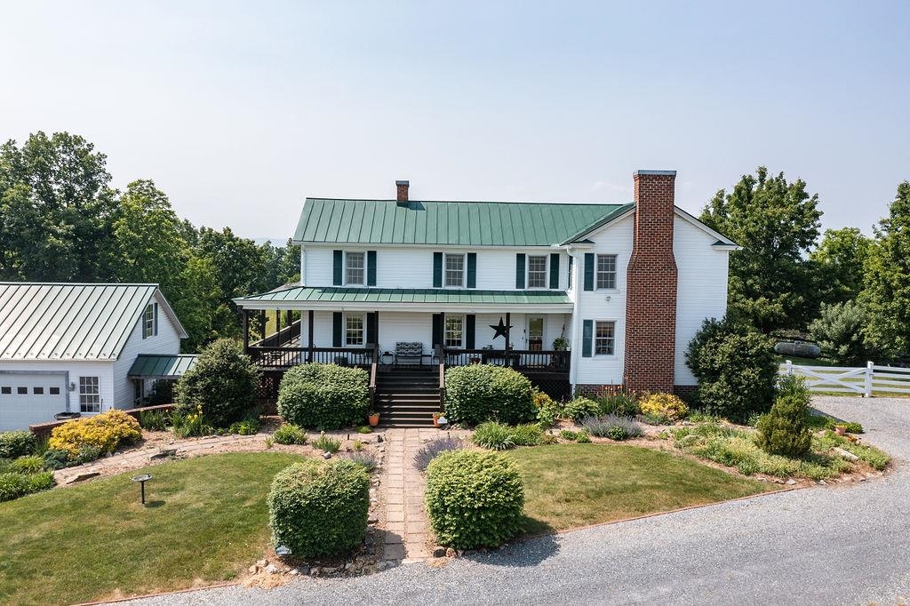 150 Ridgemore Drive Raphine, VA 24472 - Photo 65 of 75 a front view of a house with garden