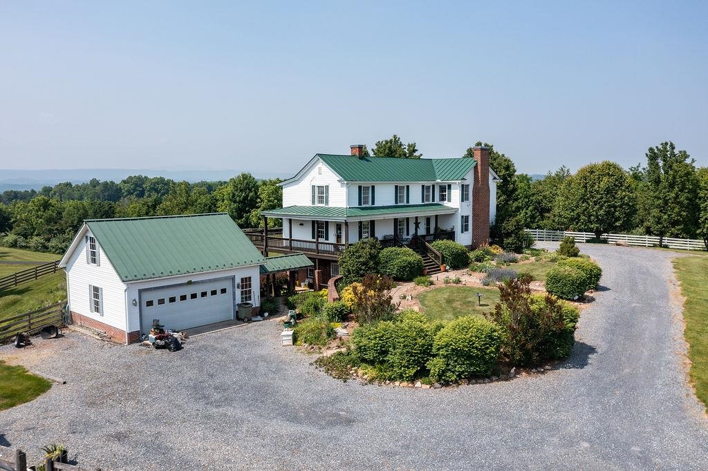 150 Ridgemore Drive Raphine, VA 24472 - Photo 68 of 75 a view of a house with a yard and potted plants