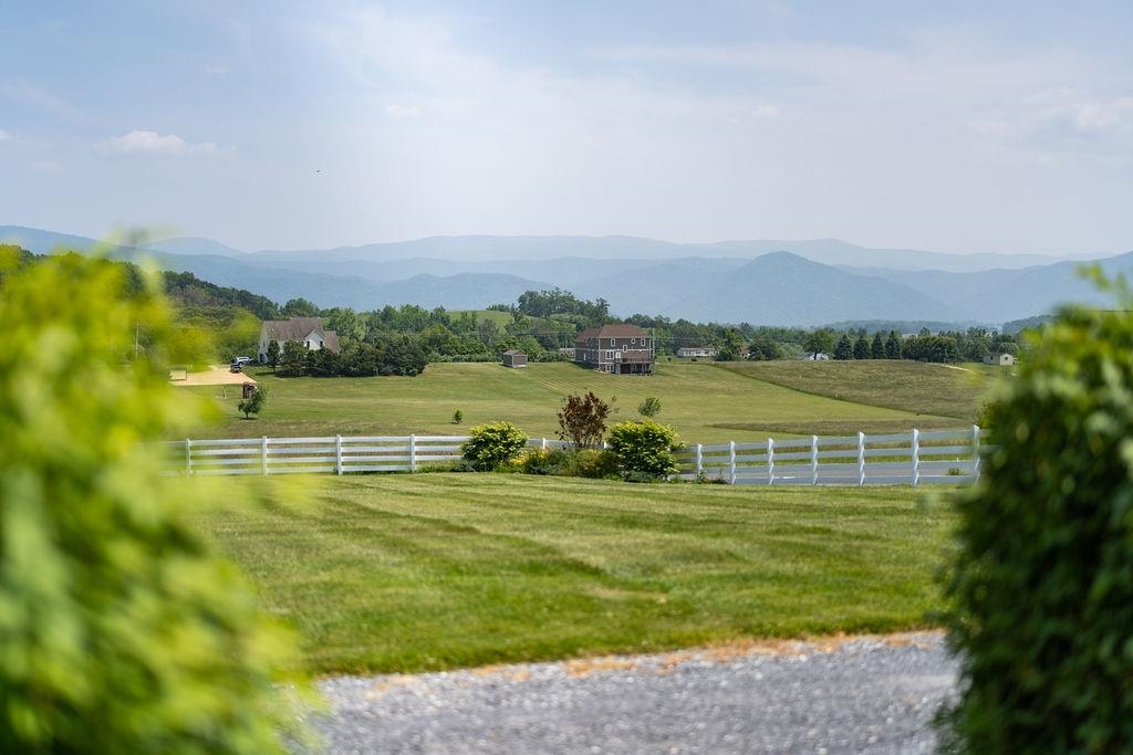 150 Ridgemore Drive Raphine, VA 24472 - Photo 75 of 75 a view of a lake with houses in the back