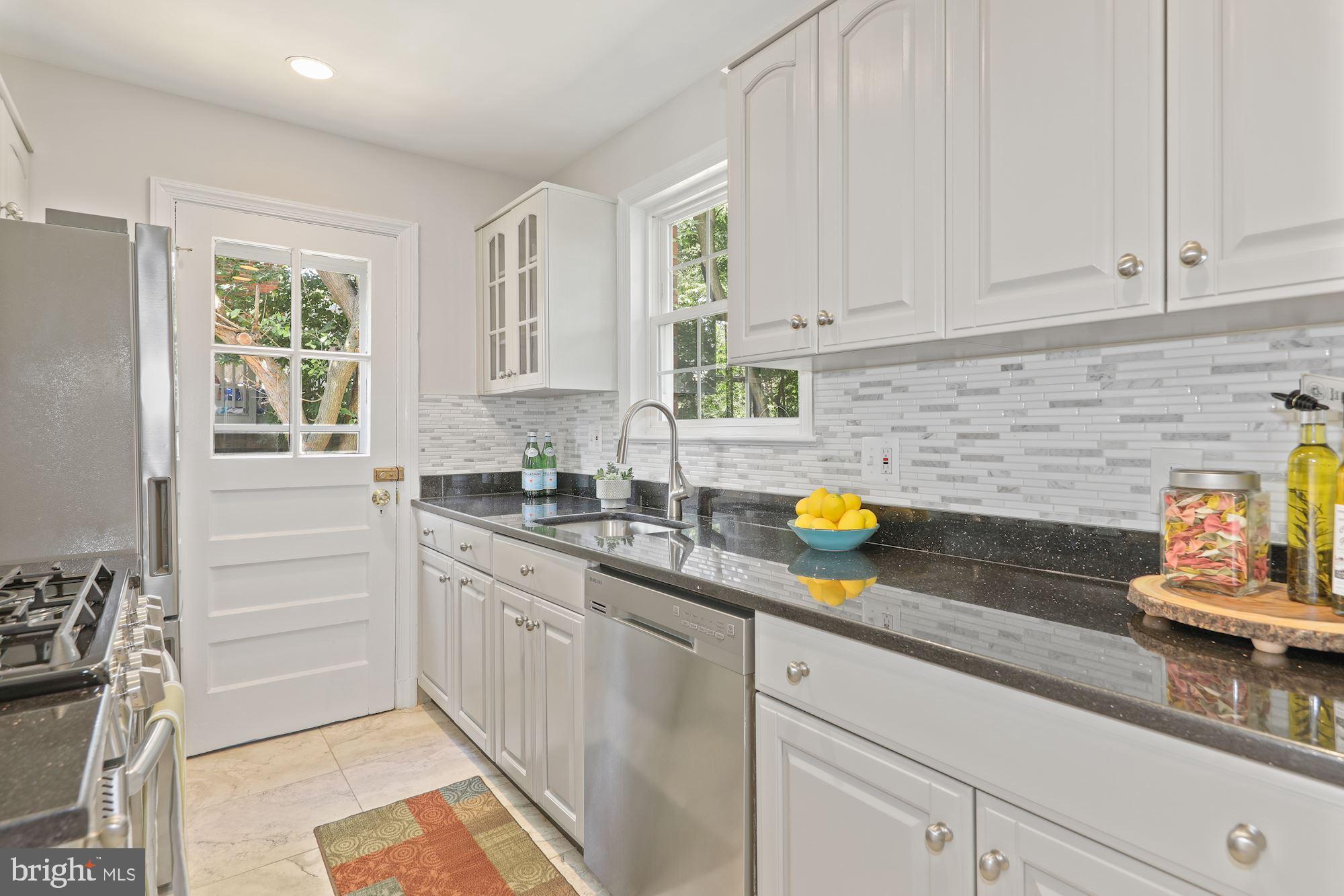 2103 Windham Place Silver Spring, MD 20902 - Photo 9 of 31 Kitchen with granite counters and SS appliances