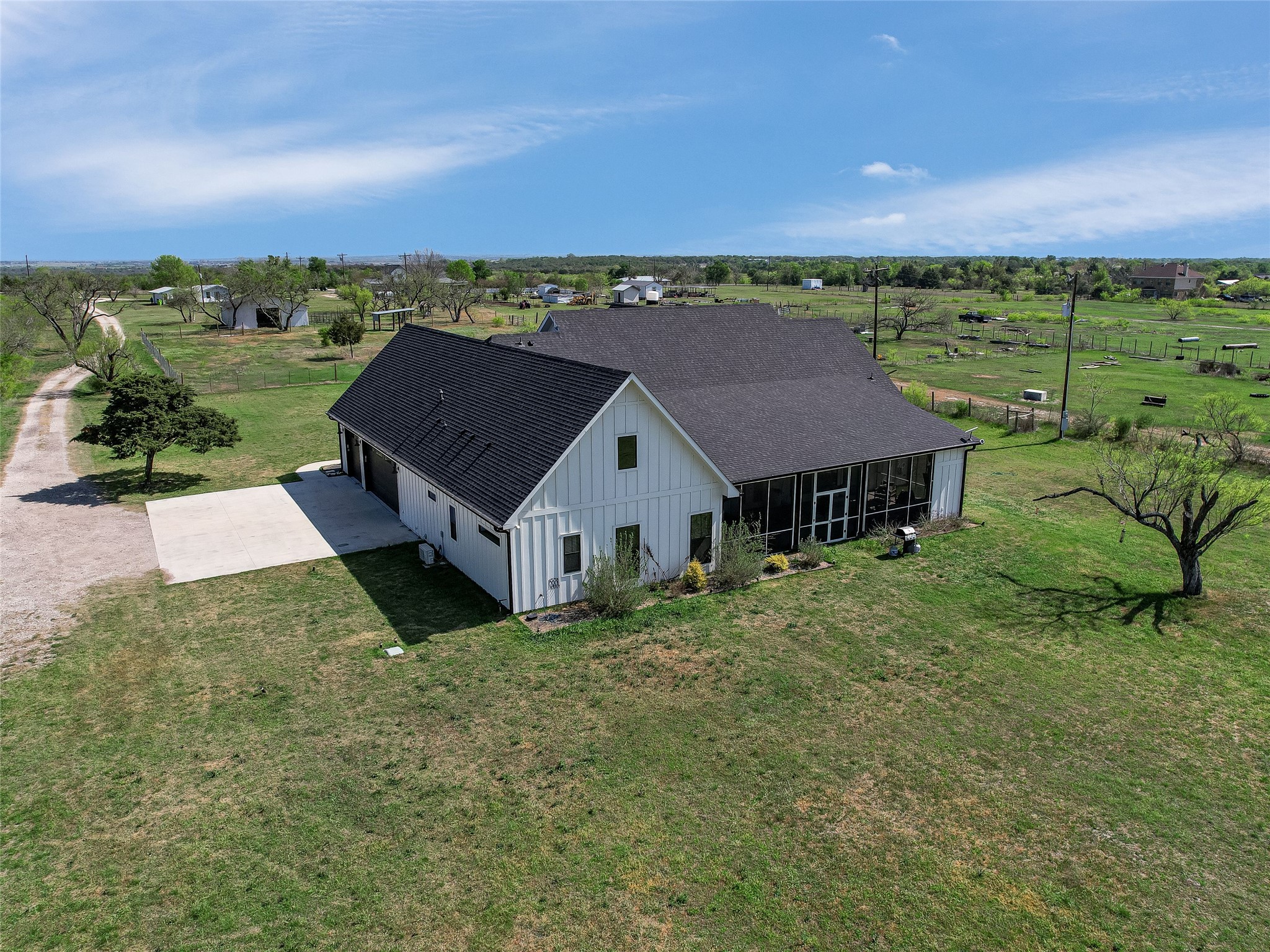 19819 Lockwood Road Manor, TX 78653 - Photo 24 of 29 Set deep into the acreage, the home commands a presence—private, peaceful, and purposefully distanced from the road for ultimate tranquility.