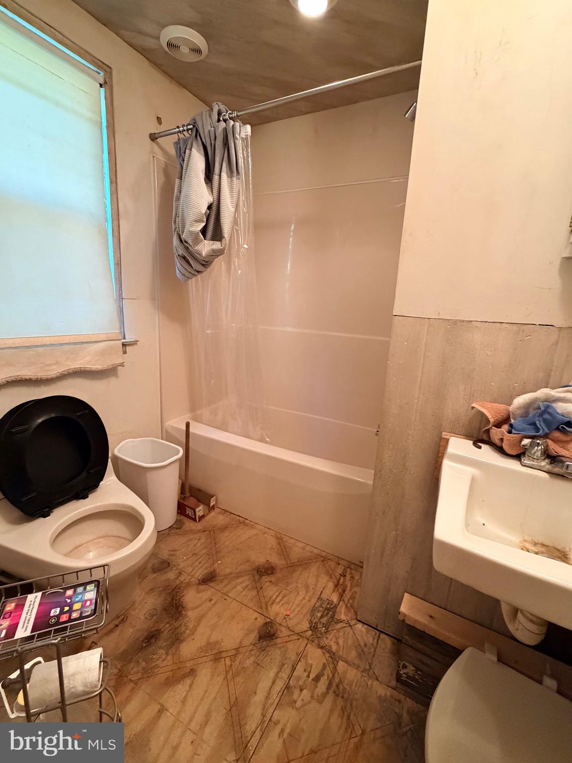 826 Trail Avenue Frederick, MD 21701 - Photo 12 of 30 a bathroom with a sink toilet and shower