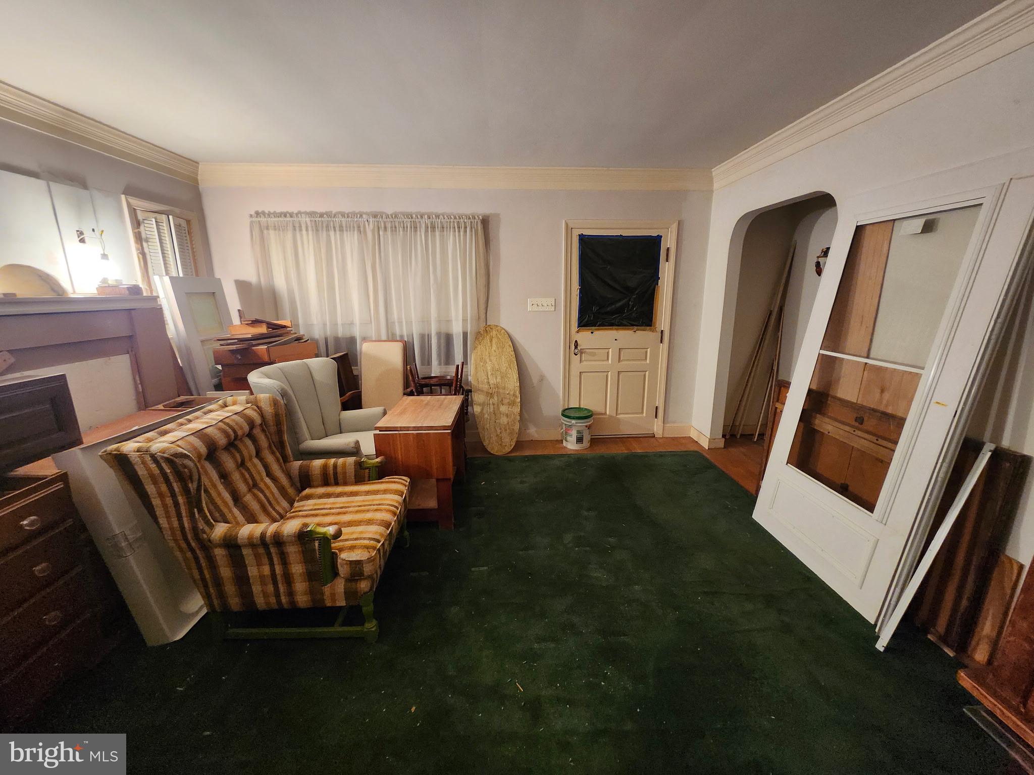 826 Trail Avenue Frederick, MD 21701 - Photo 27 of 30 a living room with furniture and a fireplace