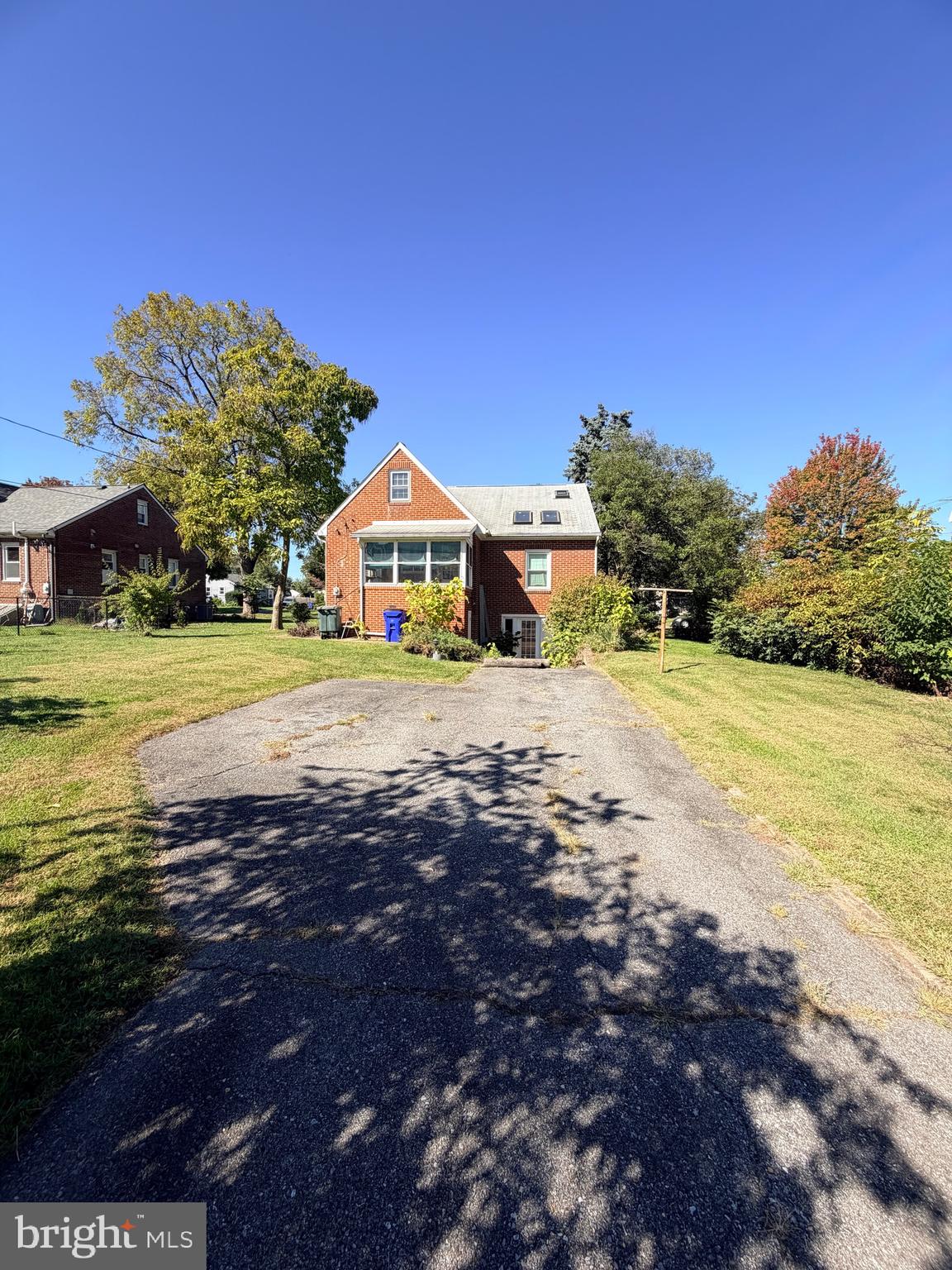 826 Trail Avenue Frederick, MD 21701 - Photo 8 of 30 a view of a house with a yard