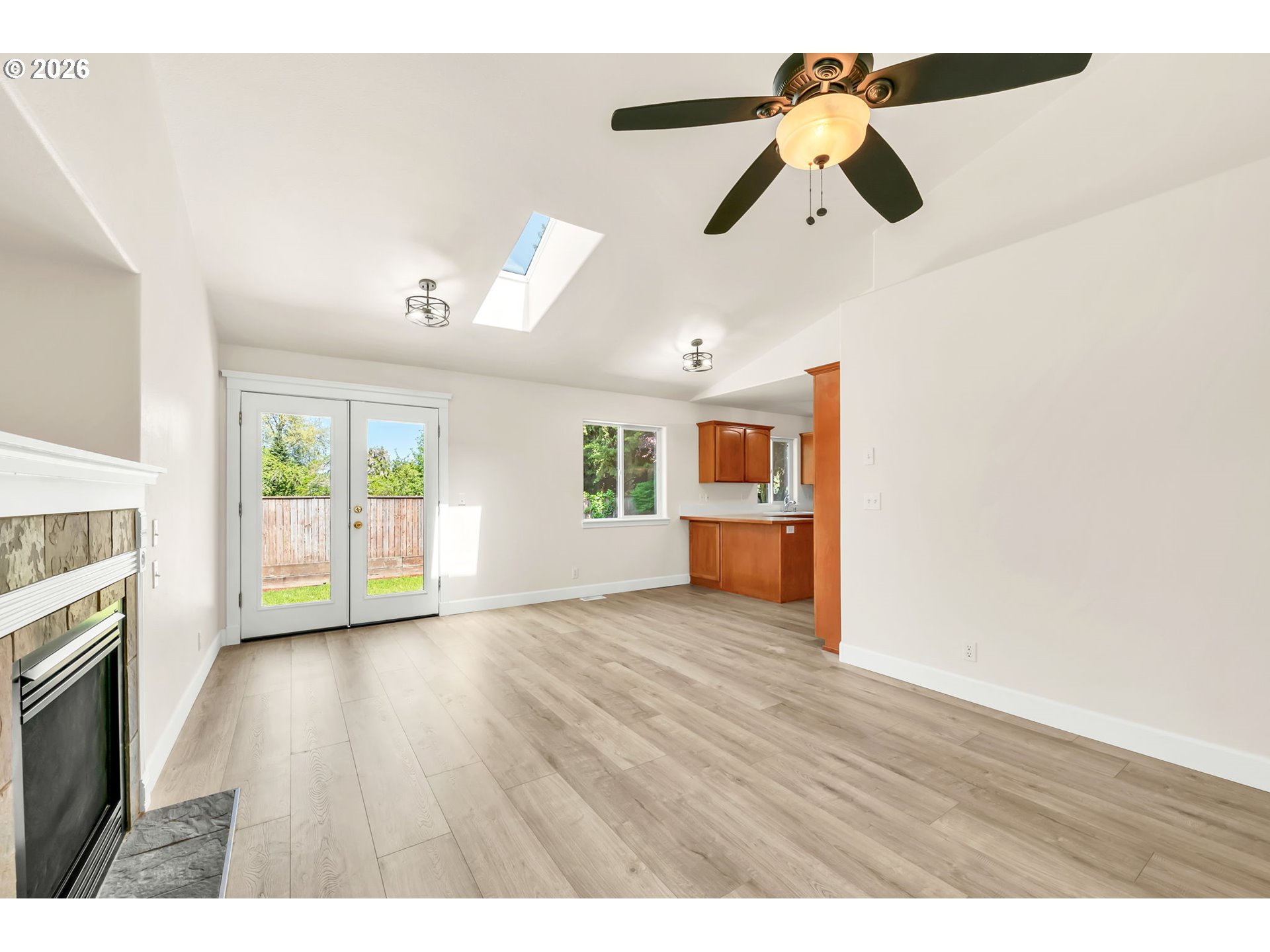585 Dublin Avenue Eugene, OR 97404 - Photo 7 of 32 a view of empty room with wooden floor and fan