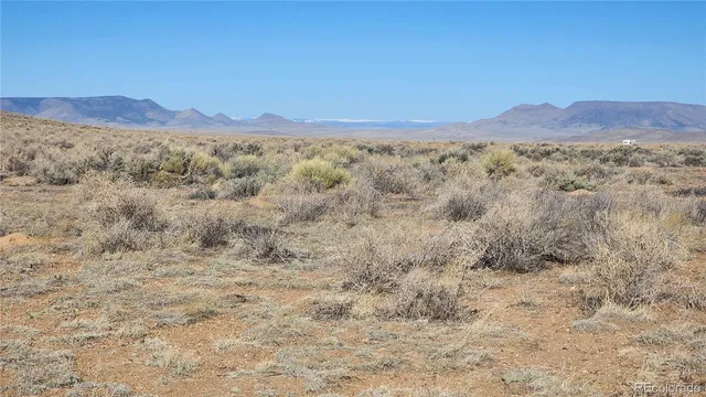 a view of mountain and a mountain
