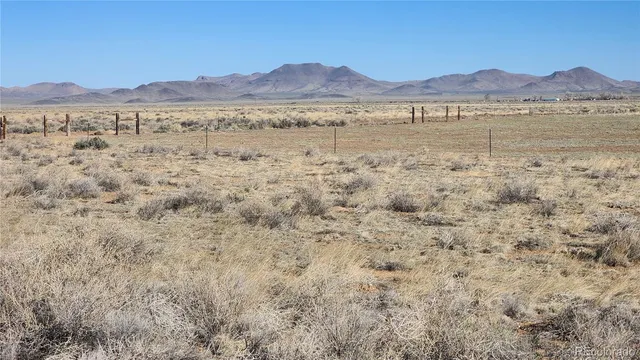 a view of lake and mountain