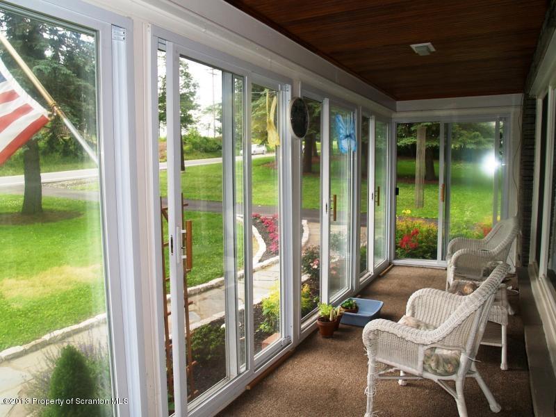 1221 Mt Cobb Road Lake Ariel, PA 18436 - Photo 27 of 29 a balcony with furniture and garden view