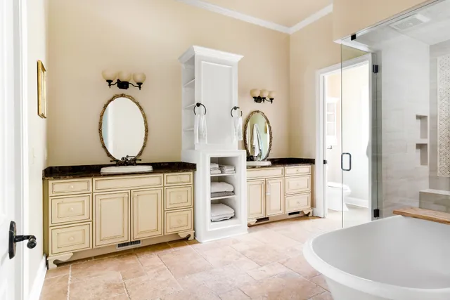 a living room with a sink furniture and a mirror
