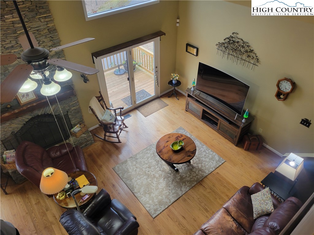 1729 Cranberry Creek Road Laurel Springs, NC 28644 - Photo 3 of 26 a living room with furniture and a fireplace