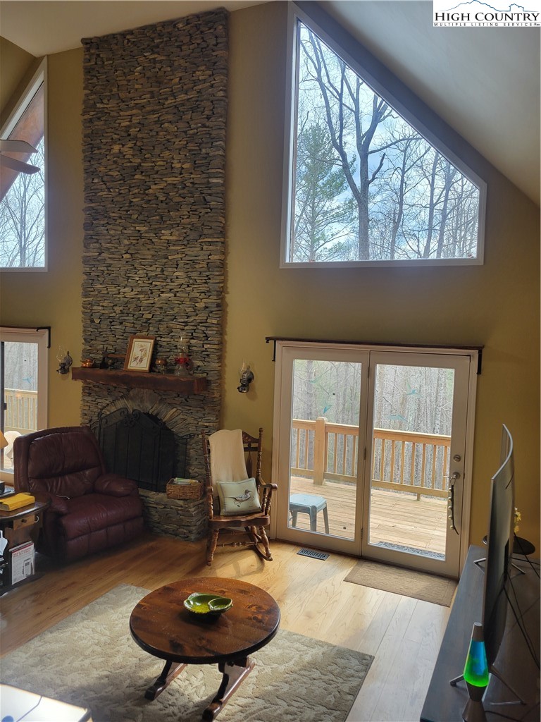 1729 Cranberry Creek Road Laurel Springs, NC 28644 - Photo 4 of 26 a living room with furniture and a fireplace