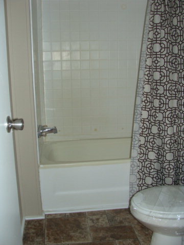 127 Morris Road Gray, GA 31032 - Photo 12 of 15 a bathroom with a toilet and a shower
