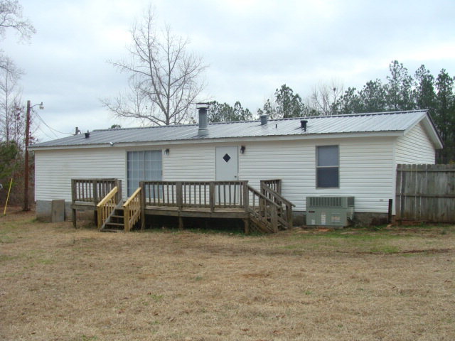 127 Morris Road Gray, GA 31032 - Photo 15 of 15 a view of a house with a yard and roof