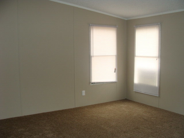 127 Morris Road Gray, GA 31032 - Photo 6 of 15 an empty room with a window