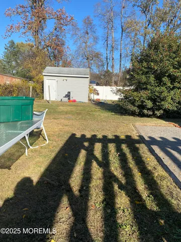 a view of swimming pool with seating space