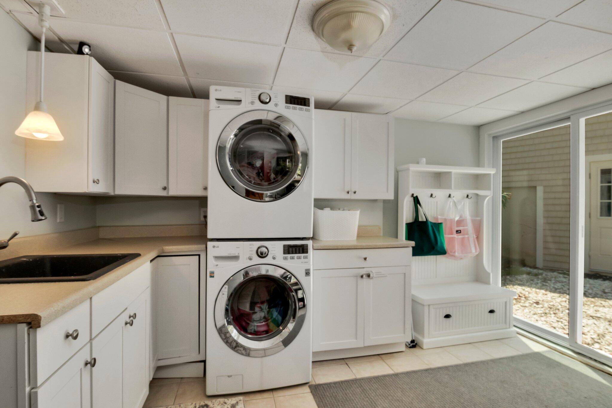 2 Palmer Road East Sandwich, MA 02537 - Photo 37 of 74 a utility room with sink dryer and washer