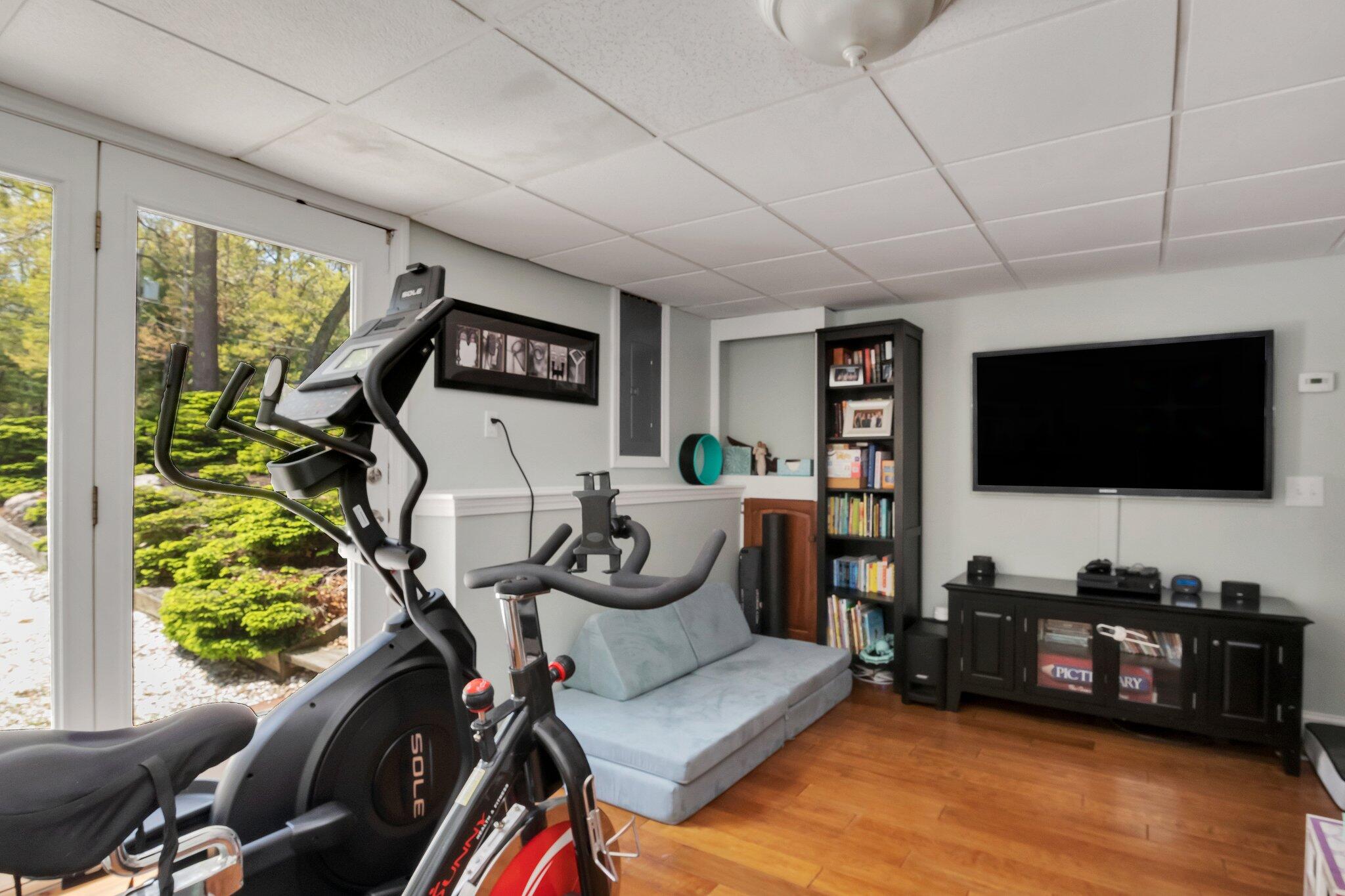 2 Palmer Road East Sandwich, MA 02537 - Photo 39 of 74 a living room with furniture and a flat screen tv