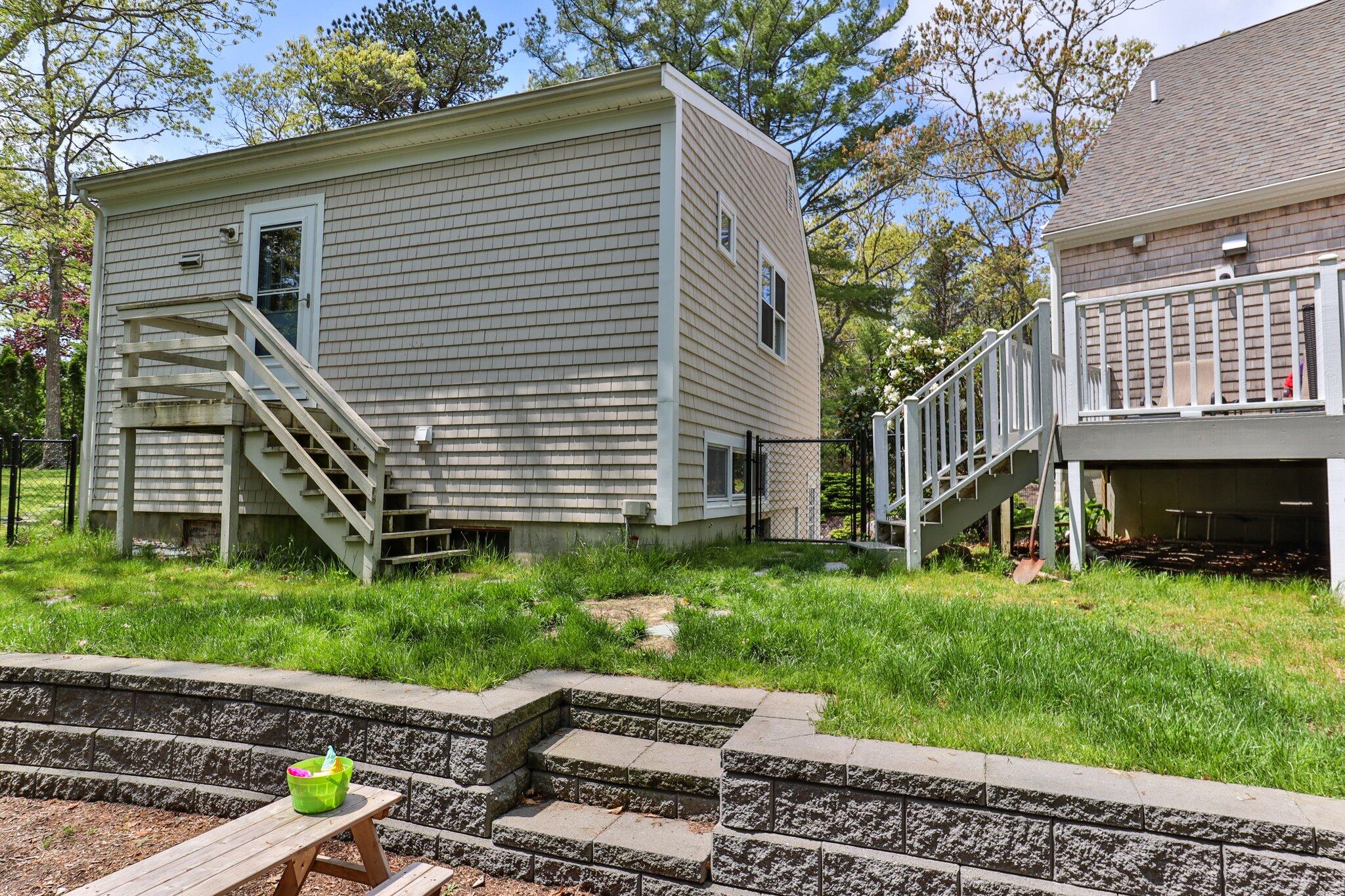 2 Palmer Road East Sandwich, MA 02537 - Photo 61 of 74 a view of a house with backyard and sitting area