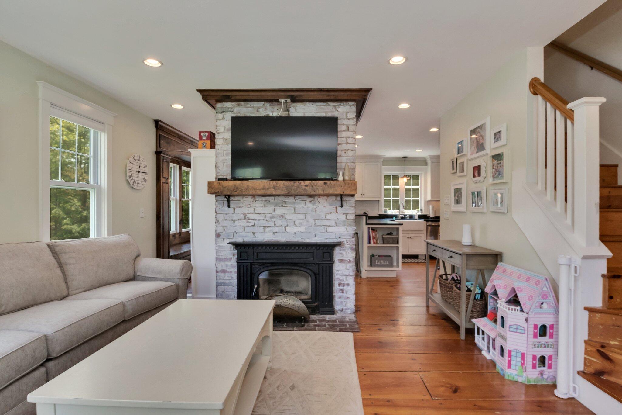 2 Palmer Road East Sandwich, MA 02537 - Photo 8 of 74 a living room with furniture and a fireplace