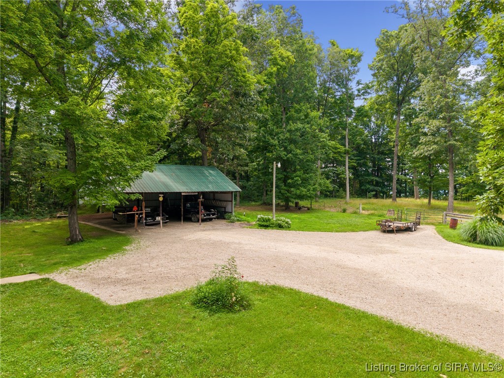 10440 East Saylor Road Salem, IN 47167 - Photo 15 of 57 Three car carport of "Buggy Barn" is pretty and functional!