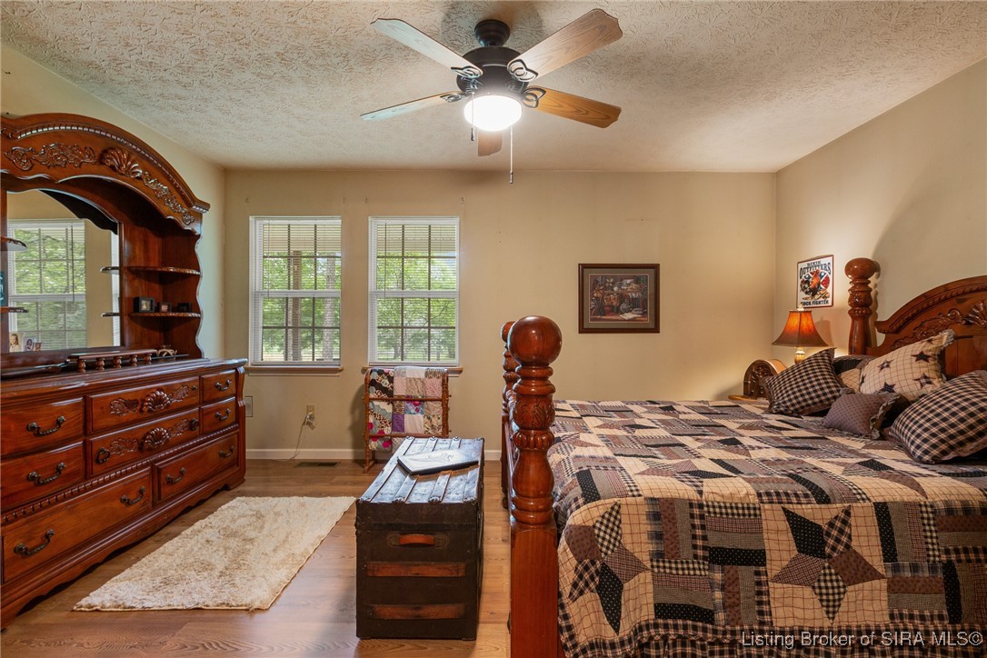 10440 East Saylor Road Salem, IN 47167 - Photo 32 of 57 Lovely first floor primary suite with double windows and a ceiling fan!