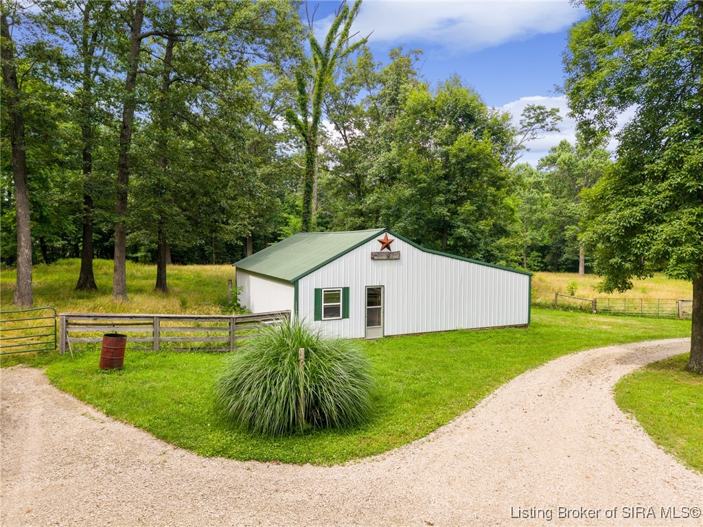 10440 East Saylor Road Salem, IN 47167 - Photo 6 of 57 Horse Barn with 2 stalls that opens to sprawling acreage to accommodate your horses or livestock!
