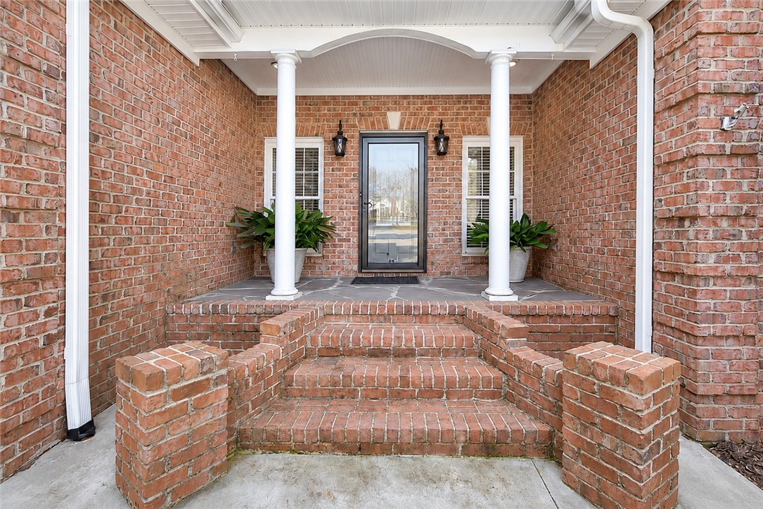 114 Augusta National Anderson, SC 29621 - Photo 1 of 47 A classic brick facade and inviting porch welcome you home.