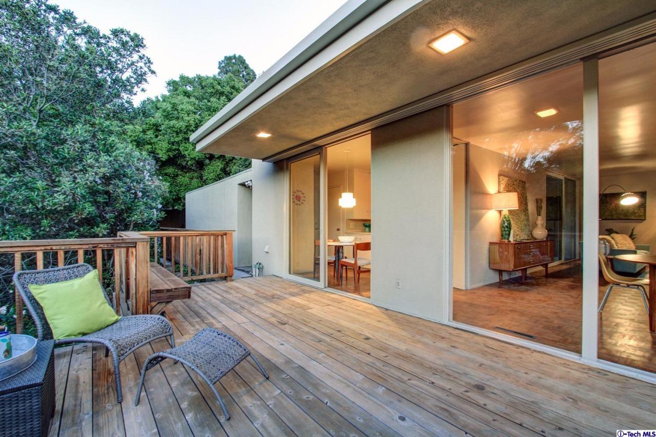1280 Glen Oaks Boulevard Pasadena, CA 91105 - Photo 31 of 38 a balcony with chairs and wooden floor