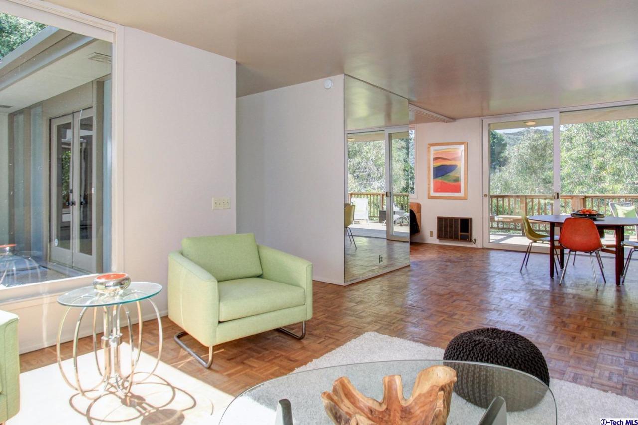 1280 Glen Oaks Boulevard Pasadena, CA 91105 - Photo 10 of 38 a living room with furniture and a large window