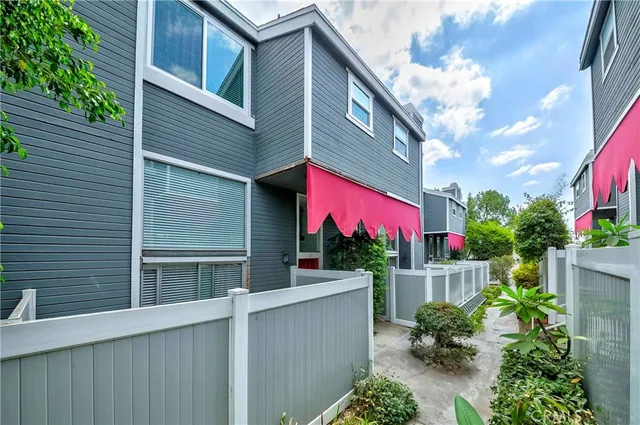 a view of a house and a yard