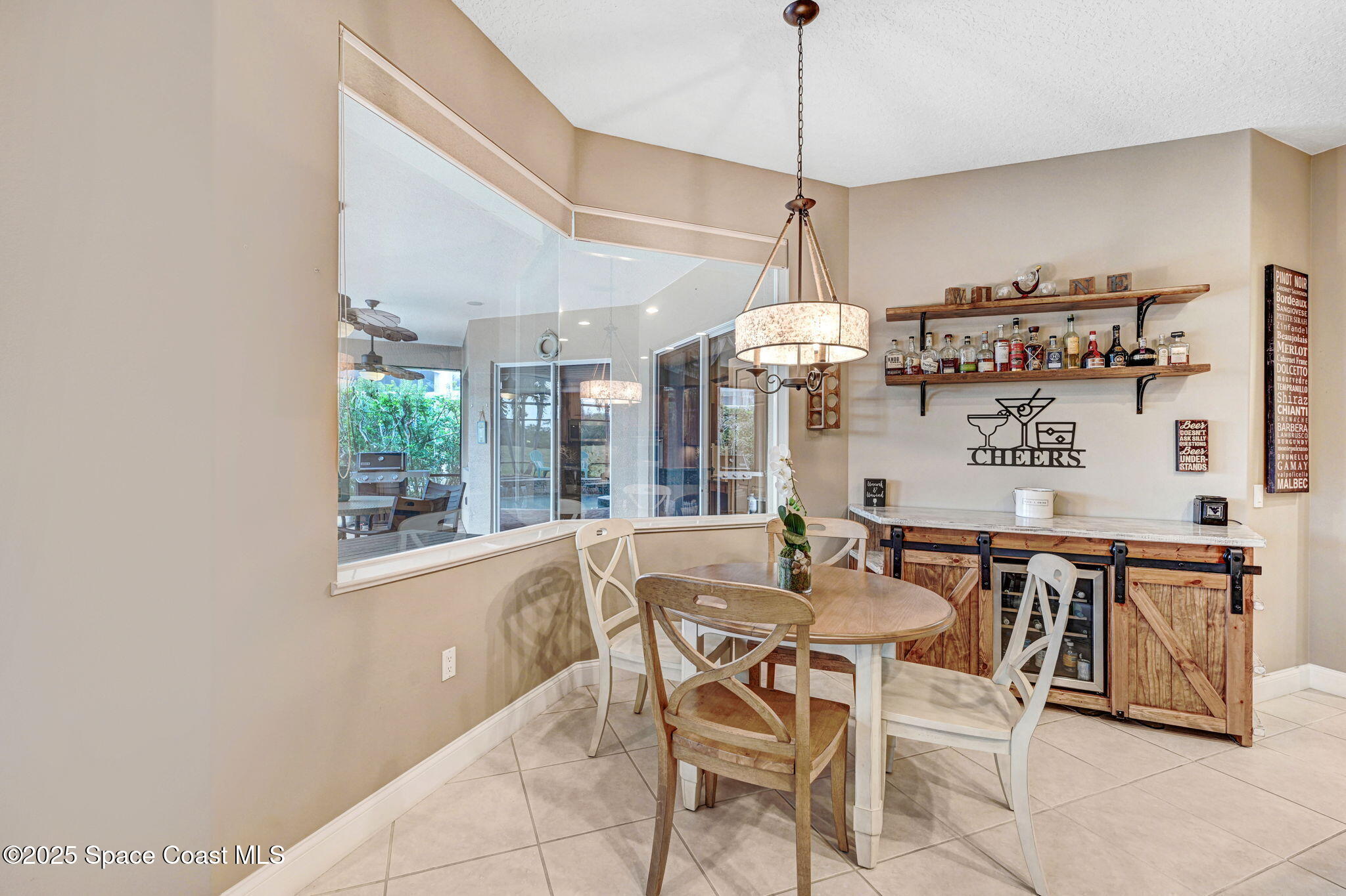 8082 Old Tramway Drive Melbourne, FL 32940 - Photo 20 of 82 a view of a dining room and livingroom
