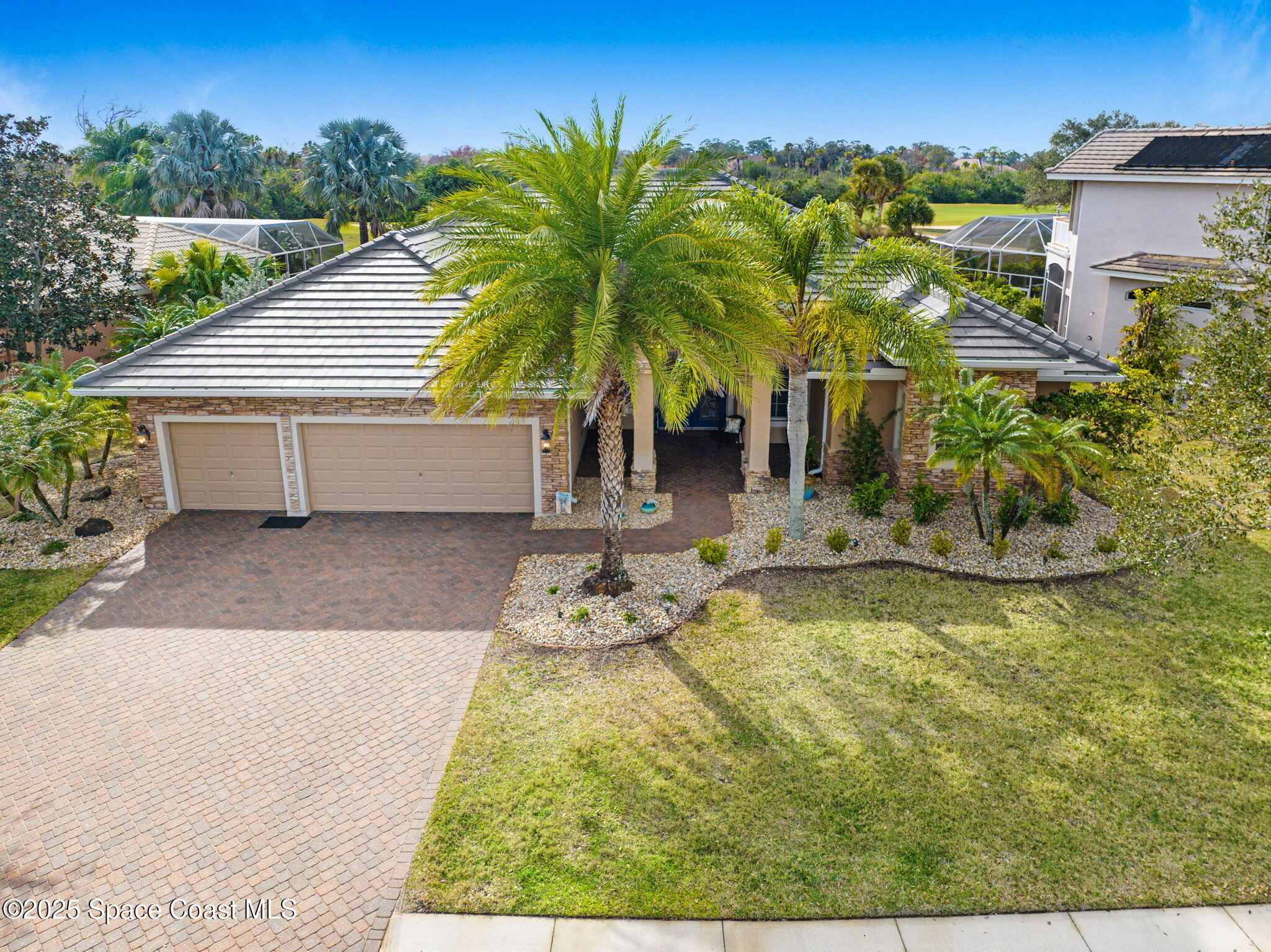8082 Old Tramway Drive Melbourne, FL 32940 - Photo 3 of 82 a view of a house with backyard porch and sitting area