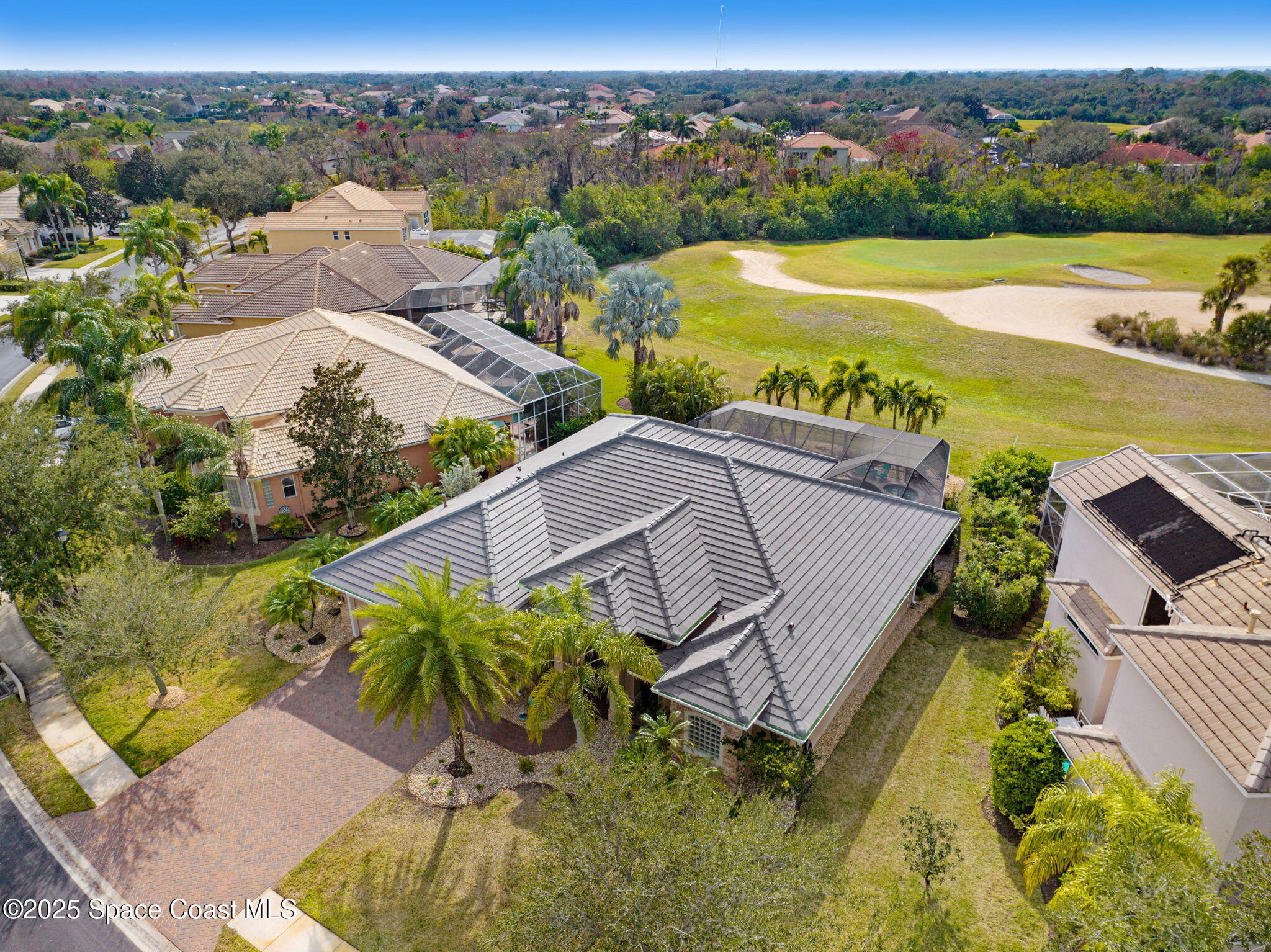 8082 Old Tramway Drive Melbourne, FL 32940 - Photo 64 of 82 an aerial view of a house with a big yard