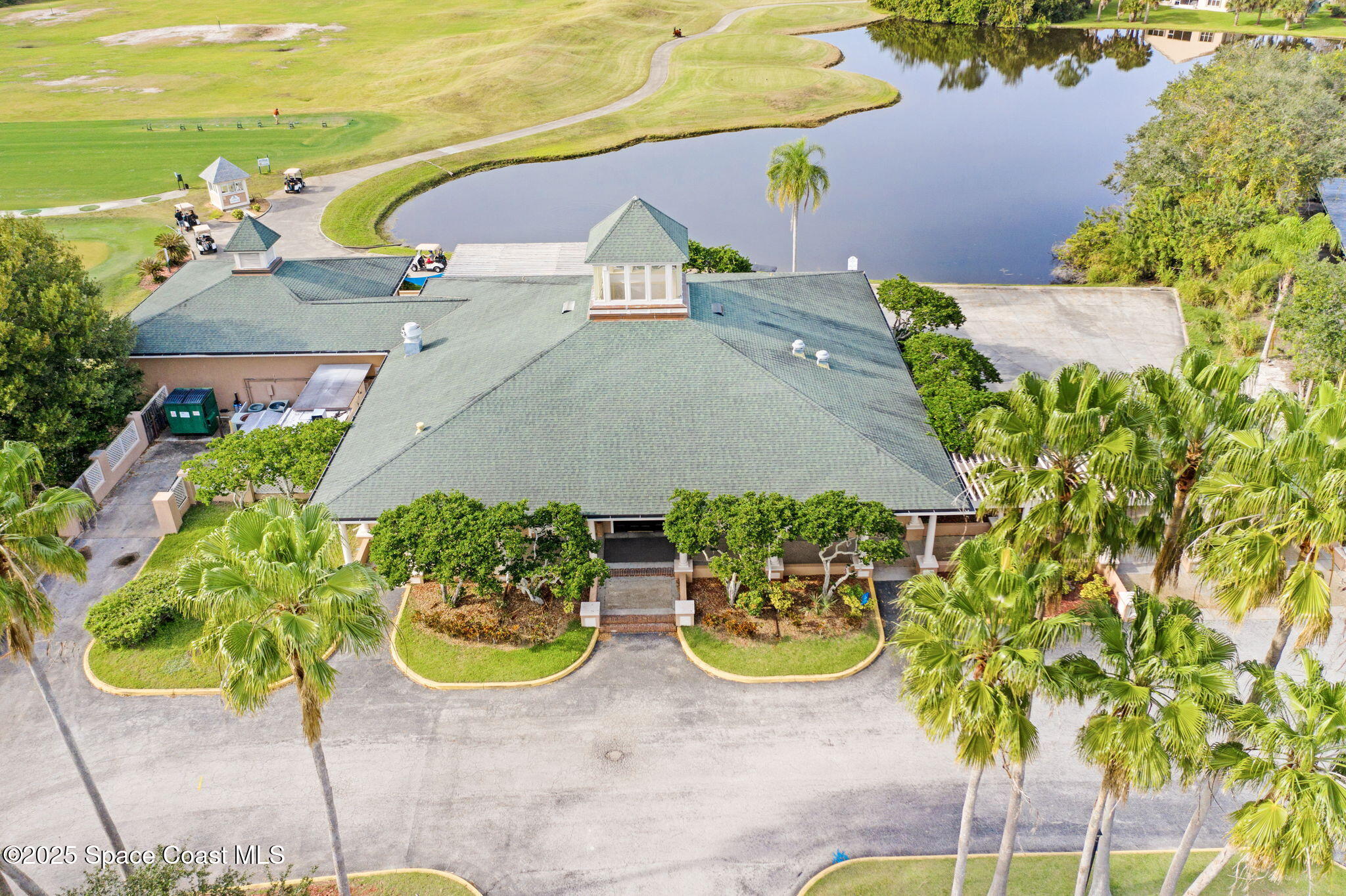 8082 Old Tramway Drive Melbourne, FL 32940 - Photo 80 of 82 an aerial view of a house with yard swimming pool and outdoor seating