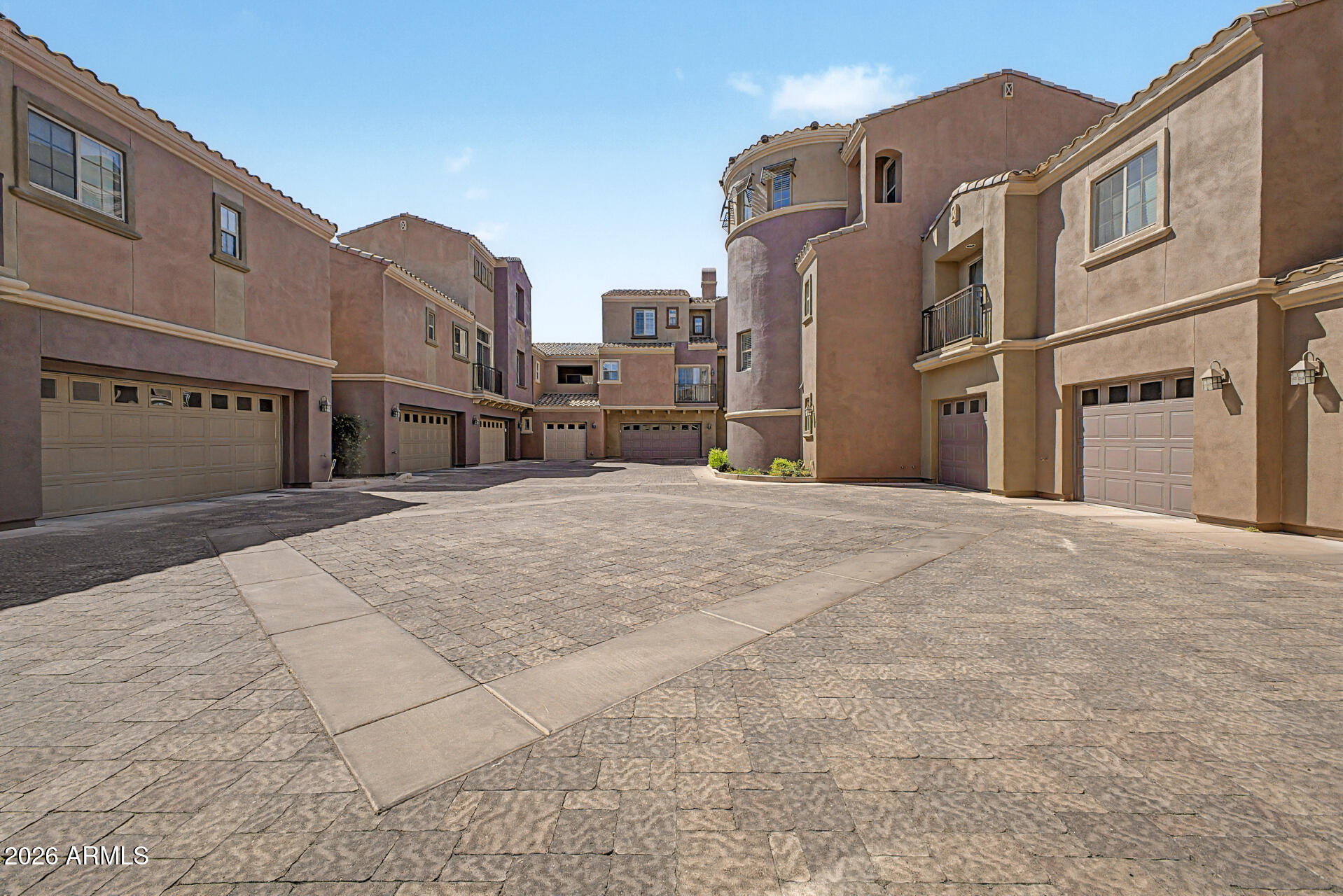 3935 East Rough Rider Road, Unit 1373 Phoenix, AZ 85050 - Photo 30 of 48 a view of a building with many windows