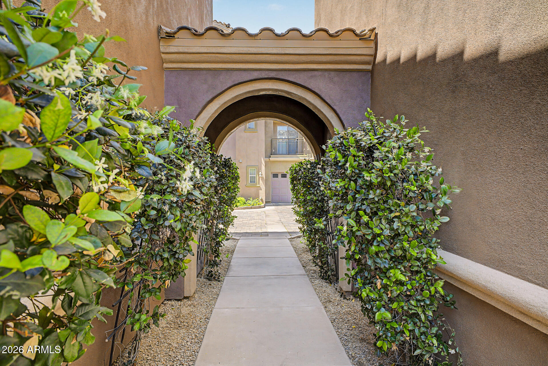 3935 East Rough Rider Road, Unit 1373 Phoenix, AZ 85050 - Photo 32 of 48 a view of entryway with garden
