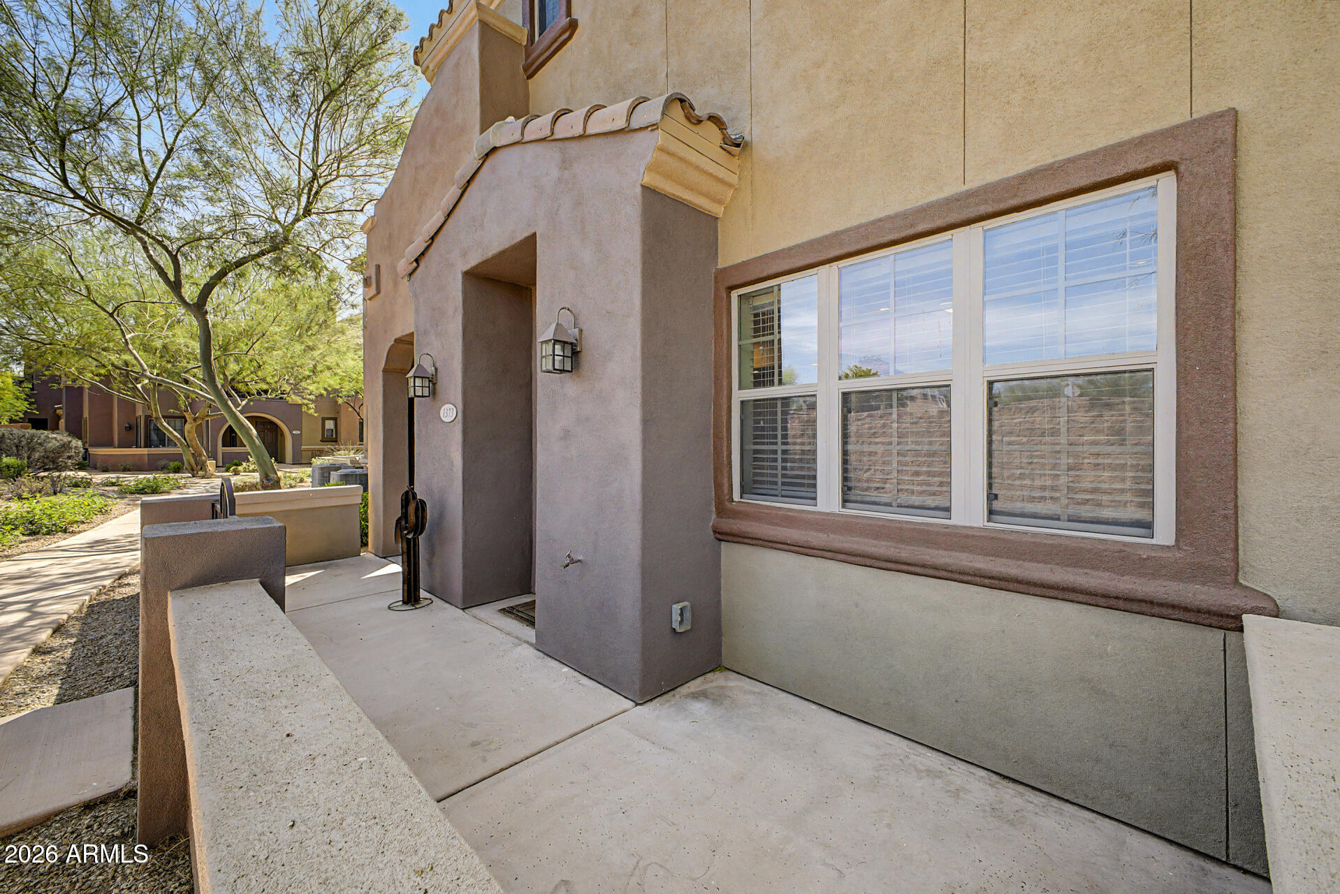 3935 East Rough Rider Road, Unit 1373 Phoenix, AZ 85050 - Photo 5 of 48 a balcony view with a outdoor space