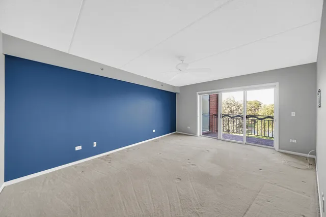 a spacious bathroom with a sink a large mirror and bathtub