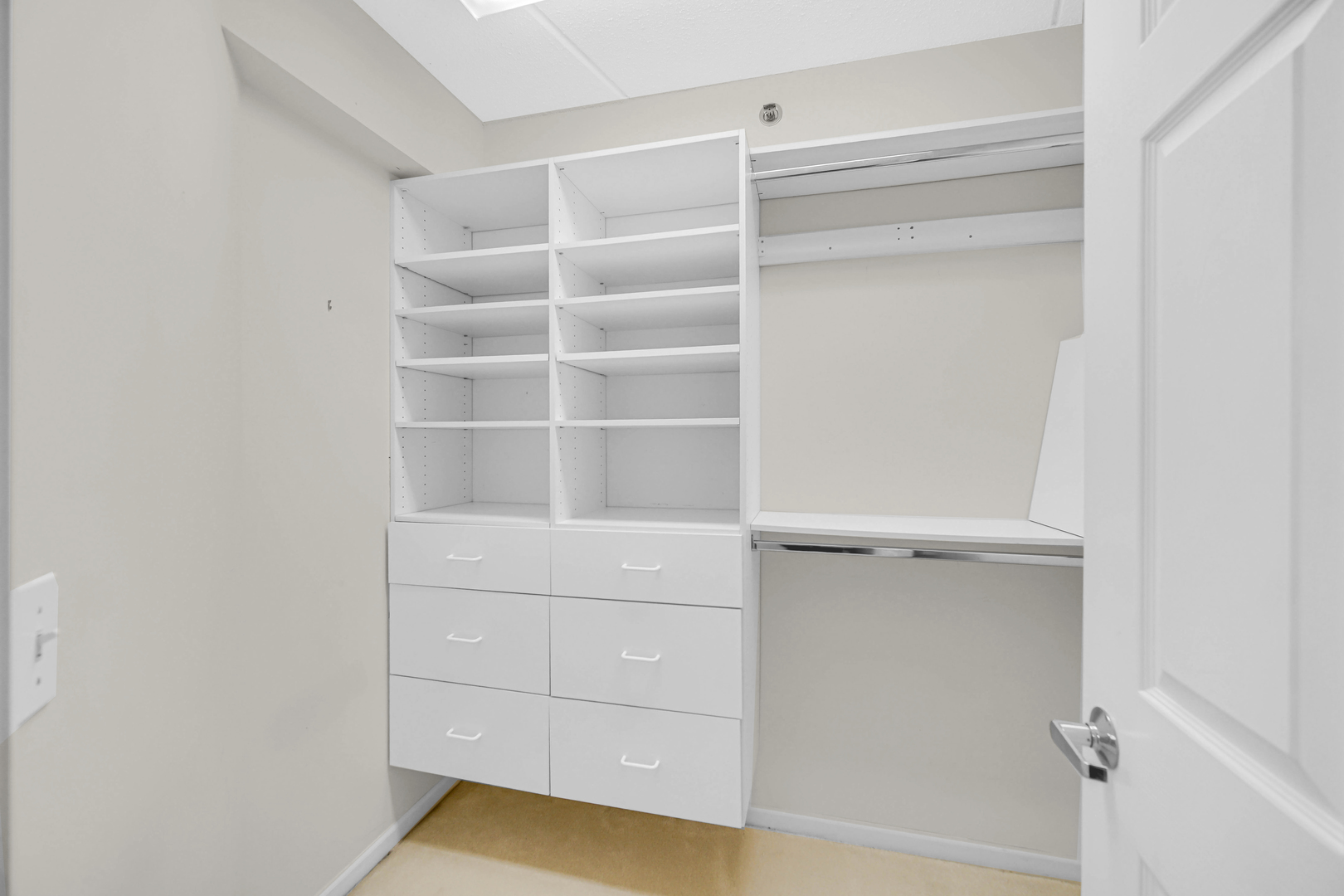 730 Creekside Drive, Unit 405C Mount Prospect, IL 60056 - Photo 18 of 34 a view of an empty walk in closet