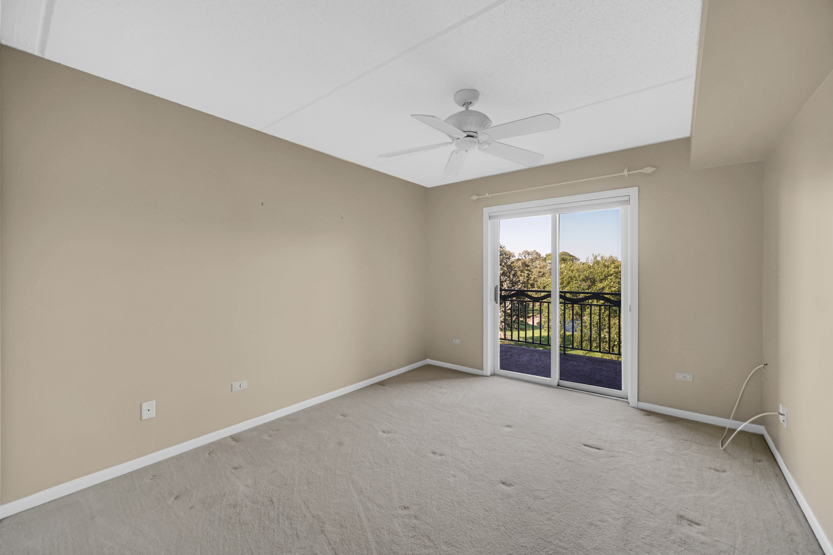 730 Creekside Drive, Unit 405C Mount Prospect, IL 60056 - Photo 21 of 34 a view of an empty room with a window