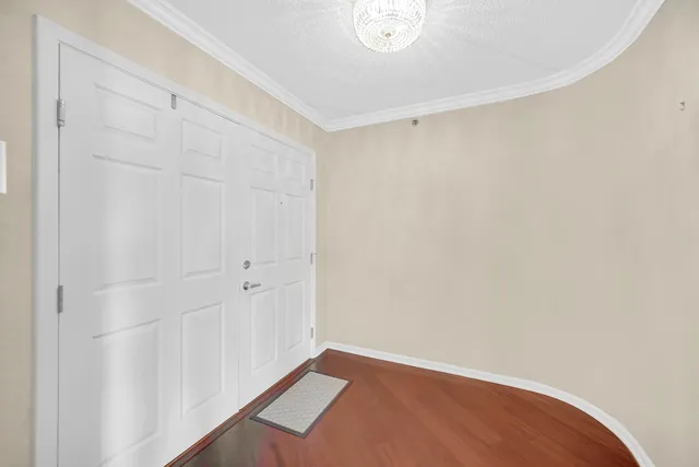 a kitchen with stove cabinets and stainless steel appliances