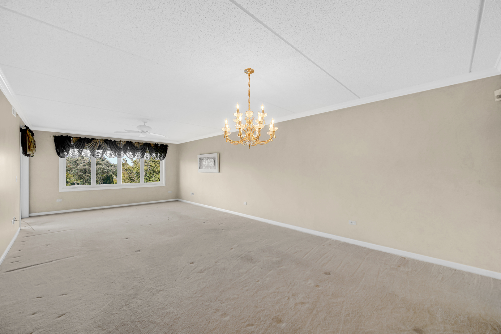 730 Creekside Drive, Unit 405C Mount Prospect, IL 60056 - Photo 9 of 34 a view of an empty room with a window