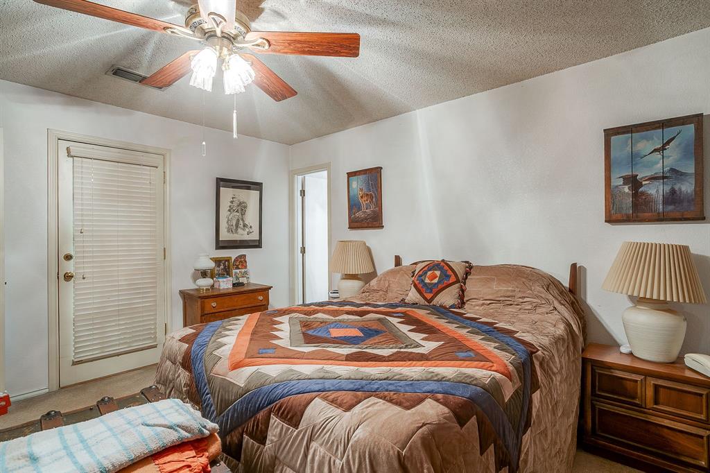 1086 Rock Ridge Drive Burleson, TX 76028 - Photo 23 of 40 a bedroom with bed and a window